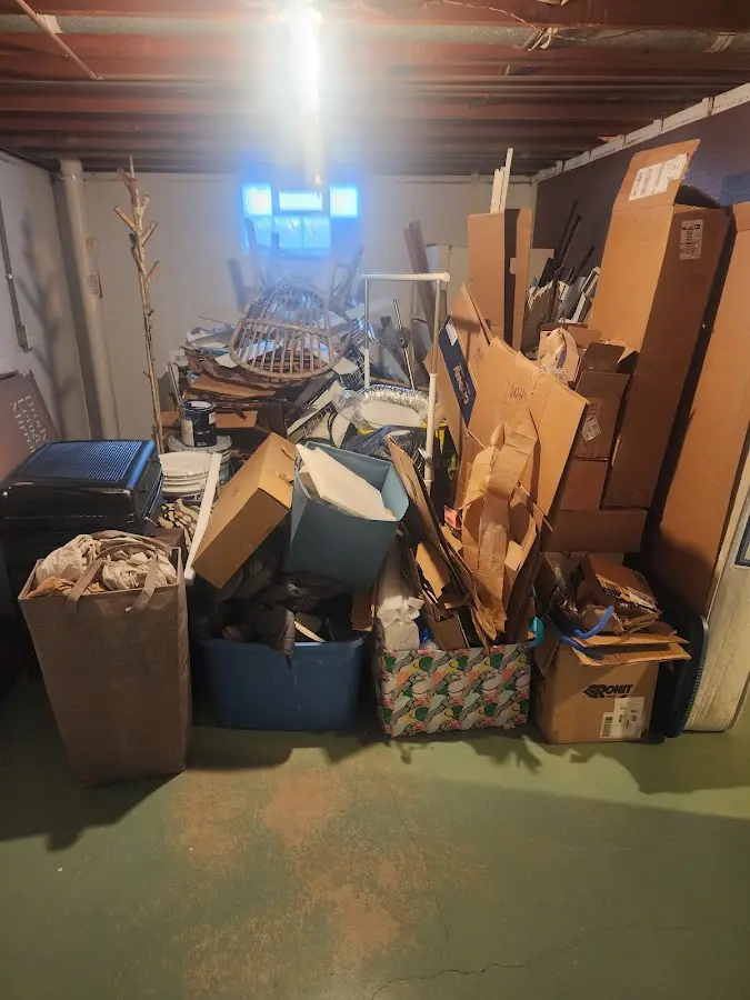 Roll-off dumpster container at job site for 2 Yard Dumpster Rental in Kurtistown